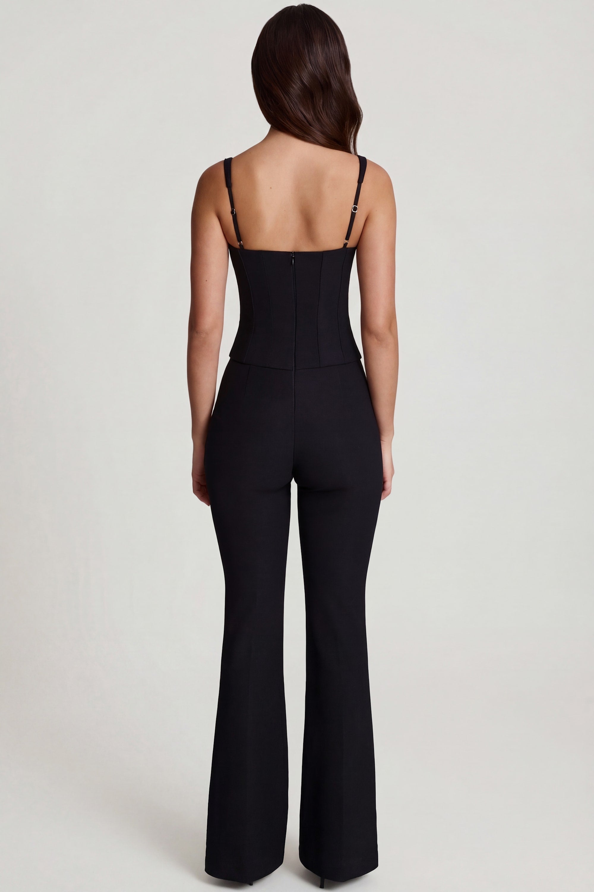 Elanie Corset Flared Jumpsuit in Black | Oh Polly