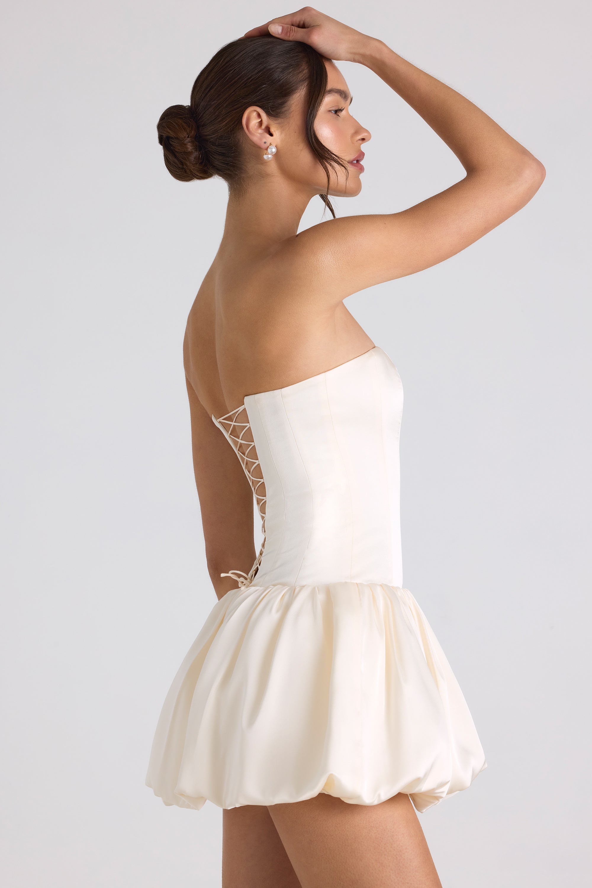 halterneck lace-up bubble hem corset micro mini dress in ivory Oh Polly Ludmila halterneck bubble hem corset mini dress in ivory