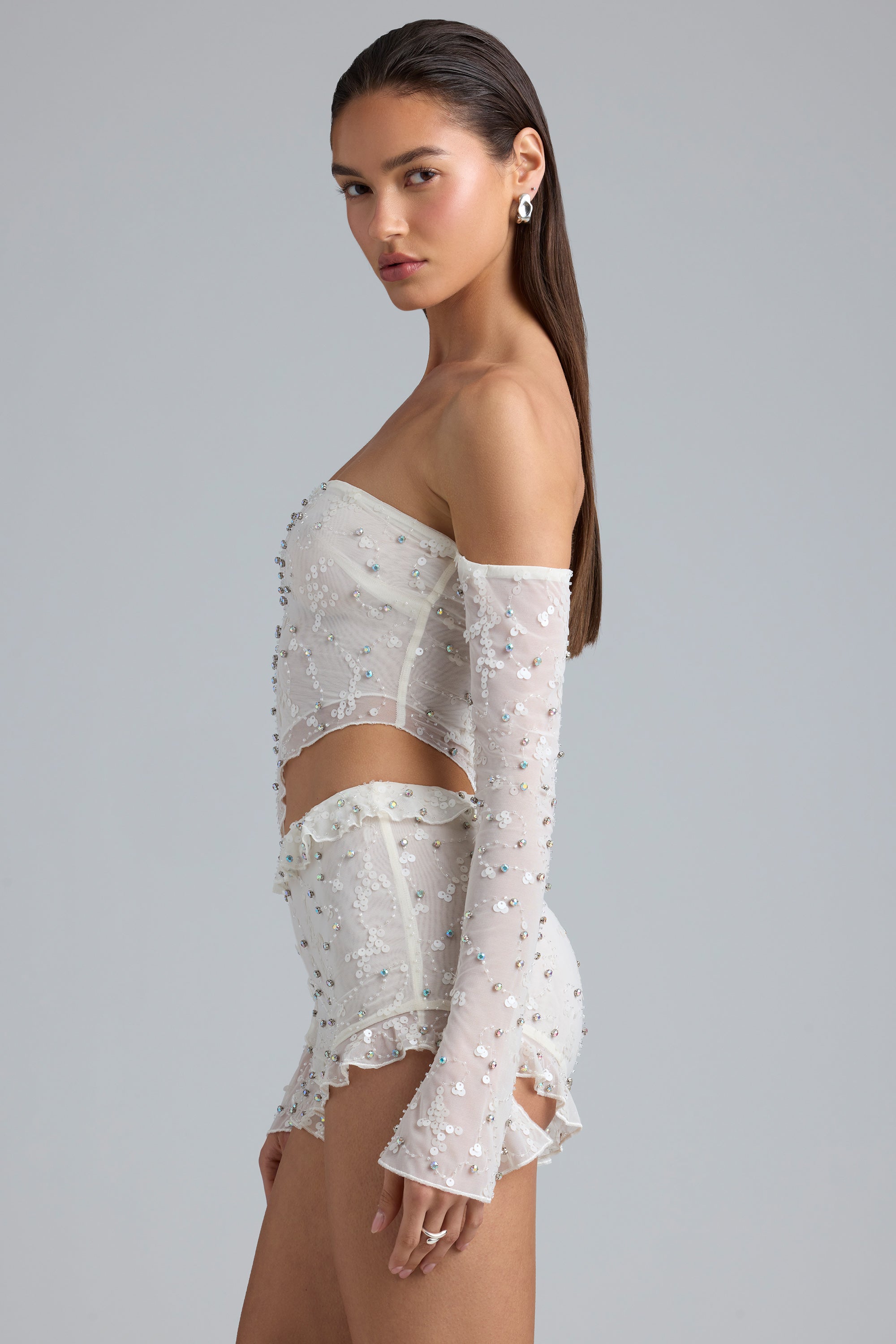 Cloe Ruffle Mid-Rise Hot Pant Shorts in Ivory Oh Polly