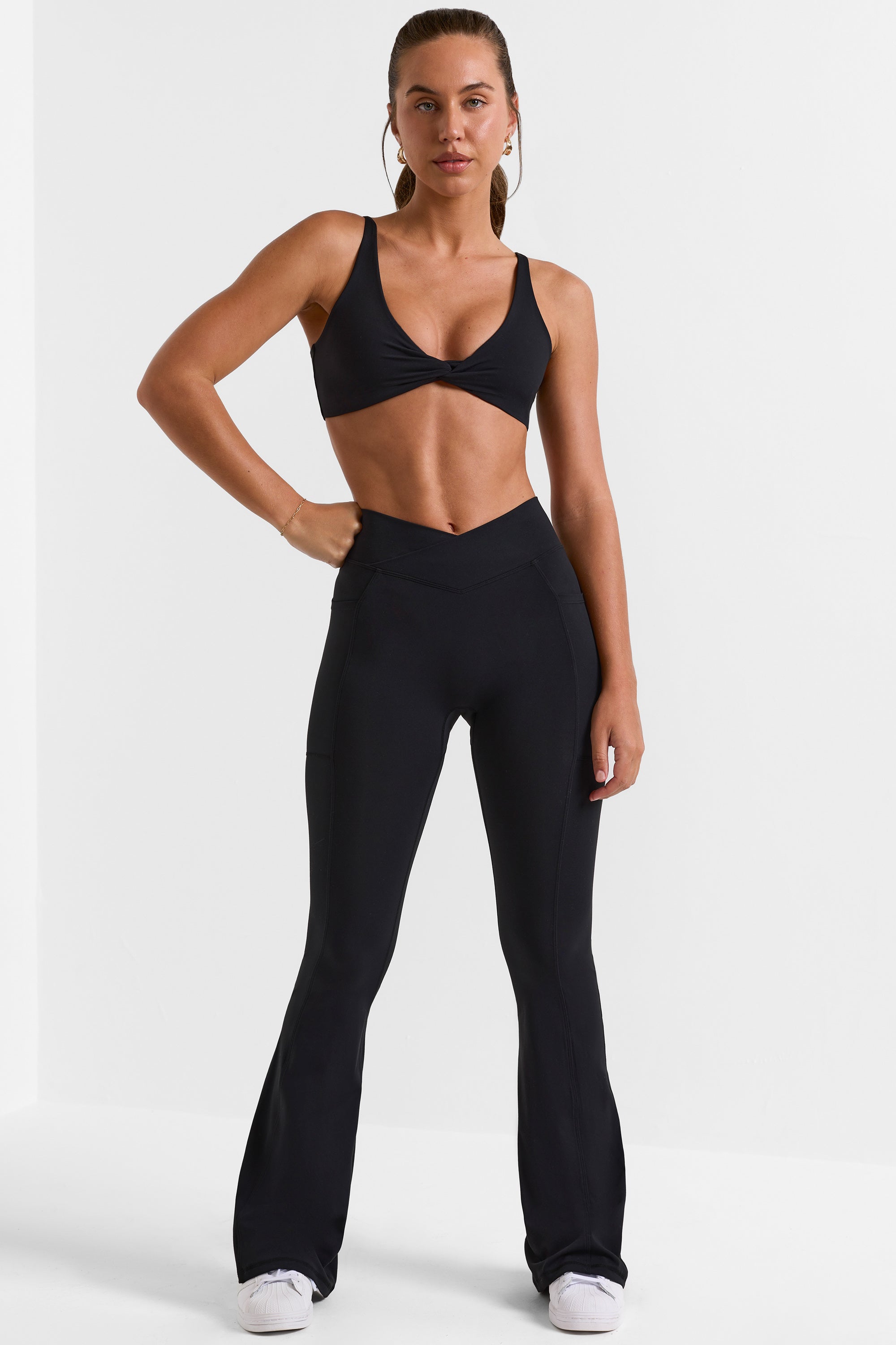 Match Cross Waistband Flare Pocket Leggings in Black | Oh Polly Match Cross Waistband Flare Pocket Leggings in Black | Oh Polly