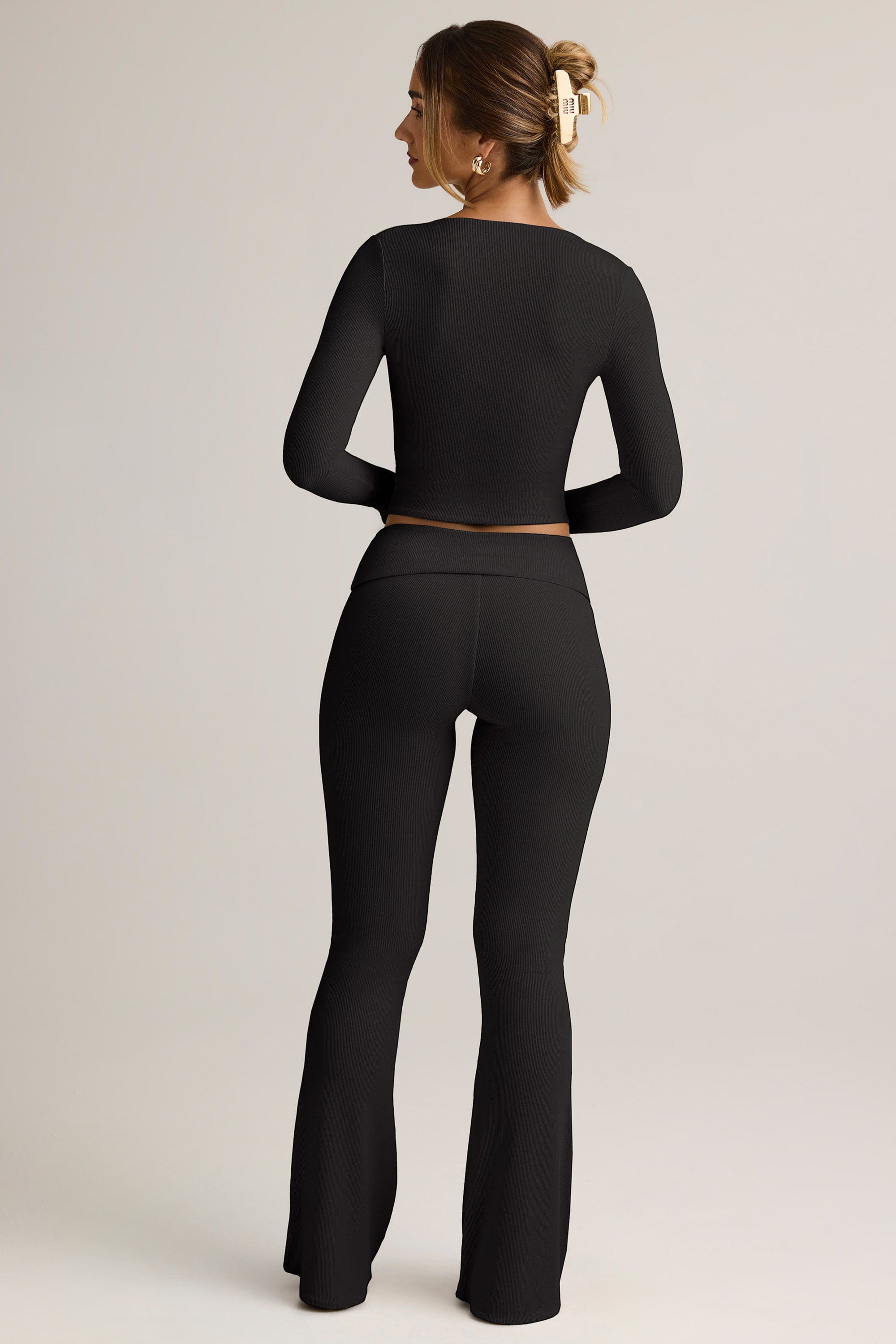 Jules Modal Ribbed Foldover Flared Trousers in Black | Oh Polly