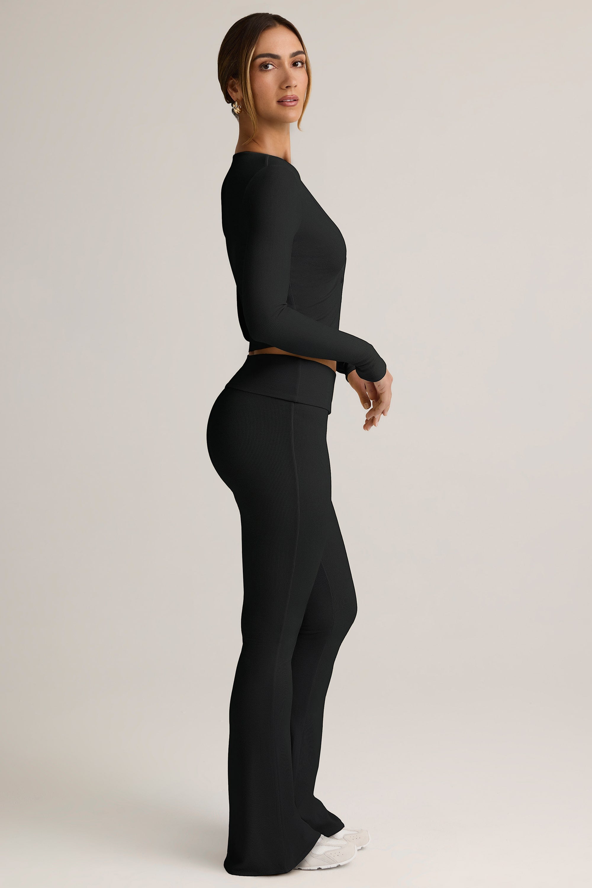 Jules Modal Ribbed Foldover Flared Trousers in Black | Oh Polly
