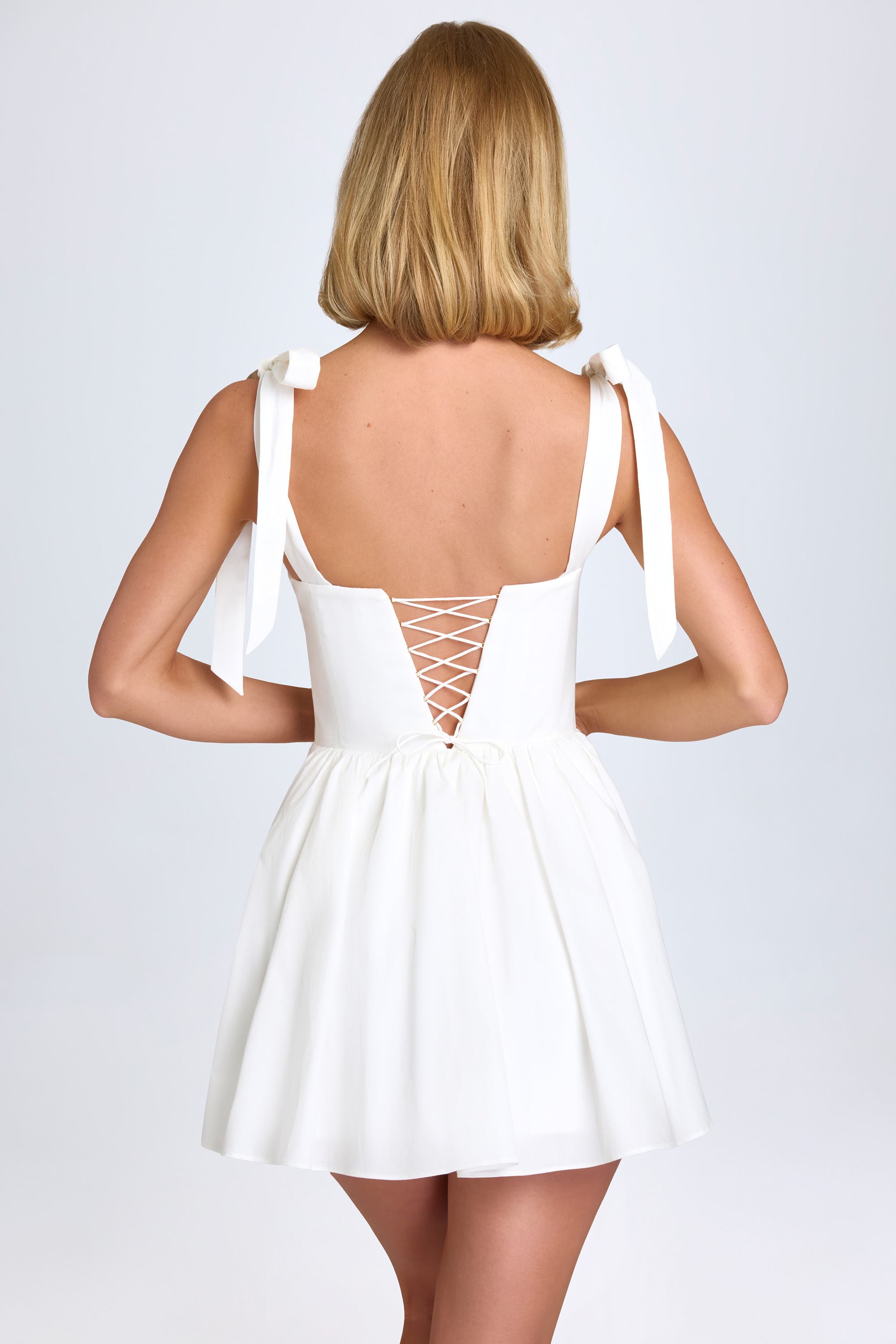 Marianna Ruched Corset Mini Dress in White | Oh Polly 6 Marianna Ruched Corset Mini Dress in White | Oh Polly 6