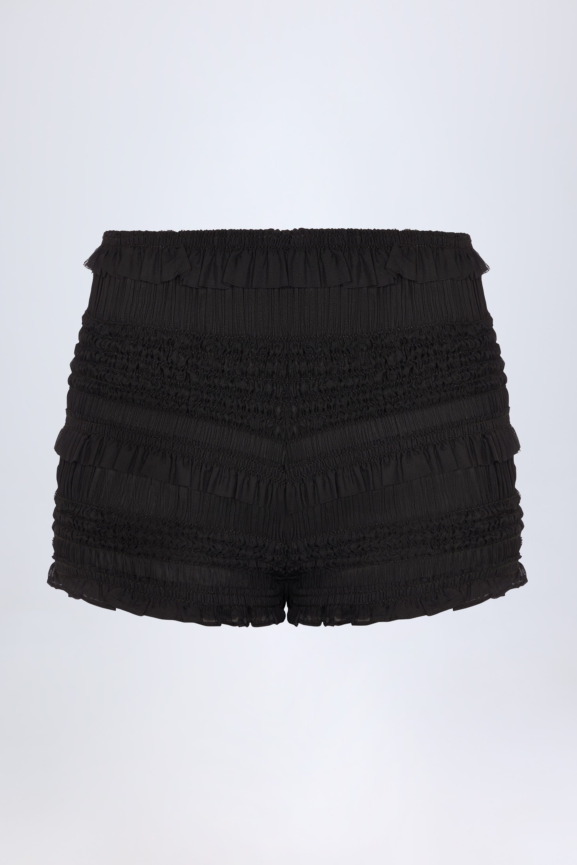 Orla Ruffled Mid-Rise Shorts in Black | Oh Polly