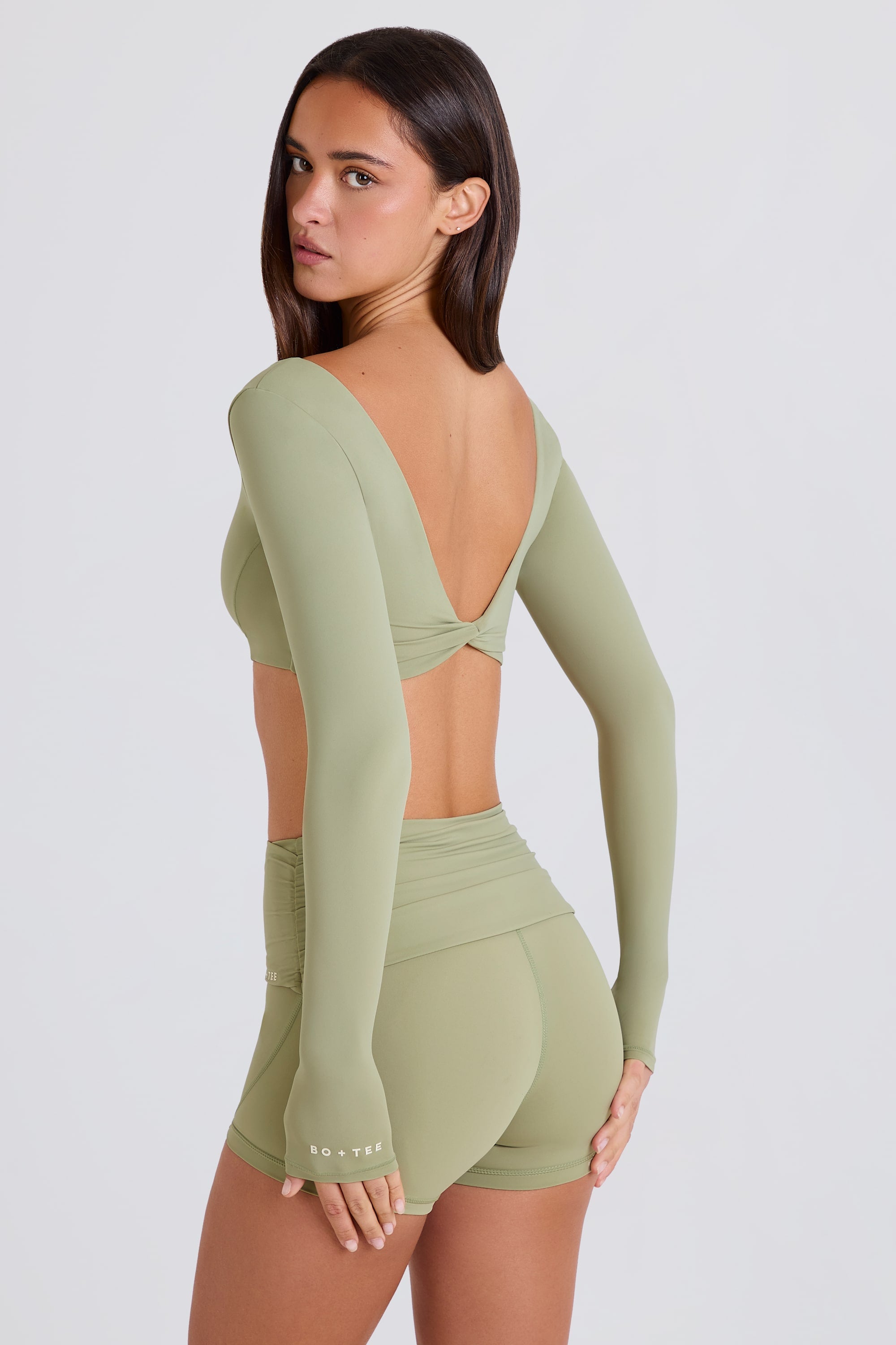 Twist-Back Long-Sleeve Crop Top in Matcha | Oh Polly