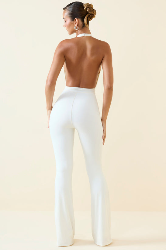 Halterneck Cut-Out Flared Jumpsuit in Vanilla