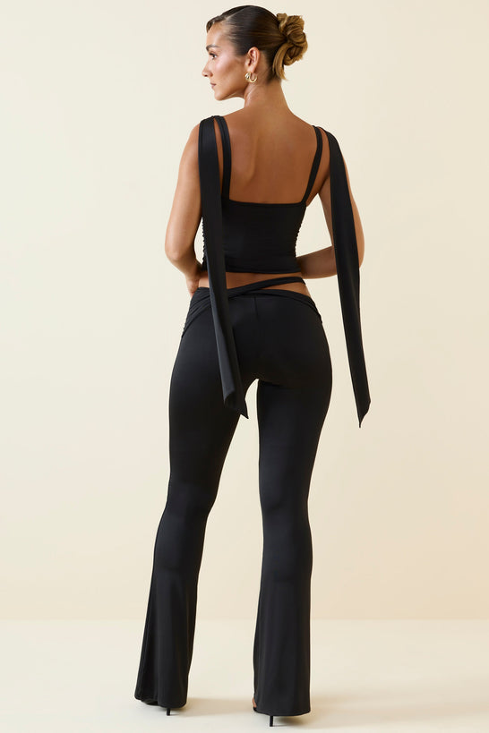 Petite Cut-Out Mid-Rise Flared Trousers in Black