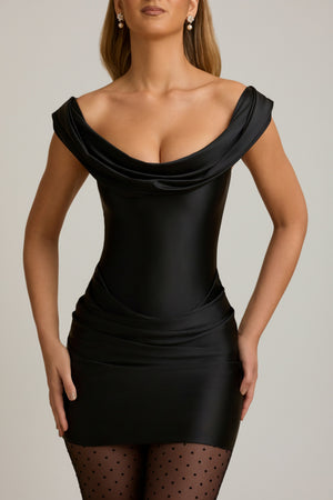 Oh Polly's Priscilla wearing the Maeve Mini Dress in Black Satin Jersey fabric perfect for upscale dinners