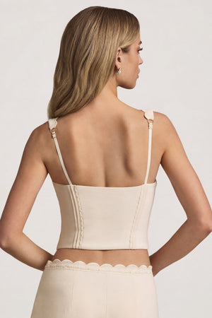 Oh Polly's Freya Tidy wearing the Lucia Corset Top in Ivory Stretch Woven fabric perfect for summer garden parties