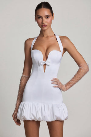 Oh Polly's Anna wearing the Millie Mini Dress in White Recycled Satin fabric perfect for cocktail evenings