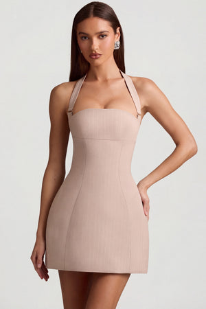 Oh Polly's Anna wearing the Odessa Mini Dress in Mushroom Stretch Woven fabric perfect for clubbing nights