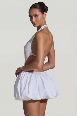 Oh Polly's Anna wearing the Cece Mini Dress in White Embellished, Recycled Satin fabric perfect for cocktail evenings
