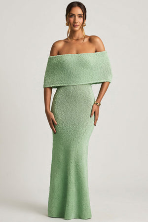 Oh Polly model Priscilla wearing the Naia Maxi Dress in Mint Boucle Knit fabric perfect for summer garden parties