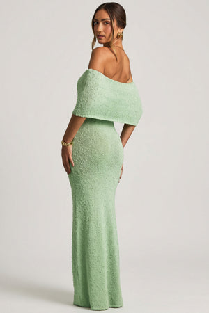 Oh Polly model Priscilla wearing the Naia Maxi Dress in Mint Boucle Knit fabric perfect for holiday getaways