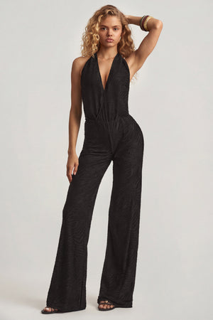 Oh Polly's Juliana Nulu wearing the Tulay Petite Jumpsuit in Black Croc Jersey fabric perfect for a night out