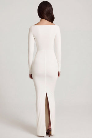 Oh Polly's Roberta wearing the Mericia Maxi Dress in White Sheer Jersey fabric perfect for summer beach parties