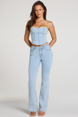 Oh Polly model Georgia wearing the Odessa Flared Jeans in Light Denim Modal fabric perfect for weekend shopping trips