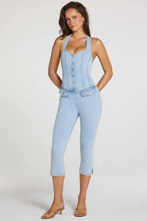 Oh Polly model Georgia wearing the Romee Jumpsuit in Light Denim Modal fabric perfect for casual office days