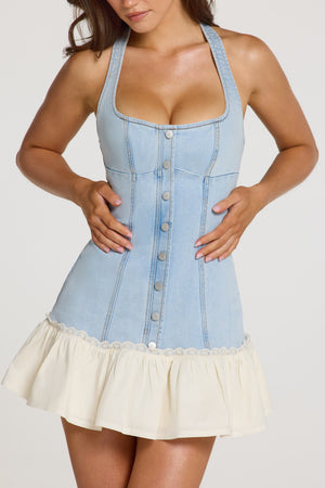 Oh Polly model Georgia wearing the Briony Mini Dress in Light Denim Modal fabric perfect for garden picnics