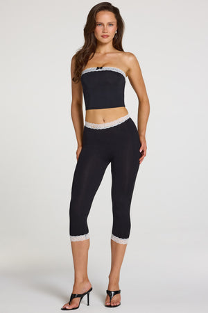 Oh Polly model Georgia wearing the Zorina Leggings in Black Modal fabric perfect for casual brunches