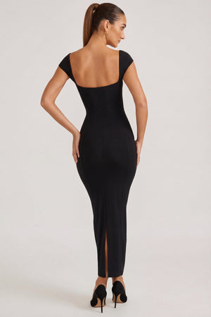 Oh Polly's Priscilla wearing the Dolcezza Maxi Dress in Black Modal fabric perfect for elegant evening events