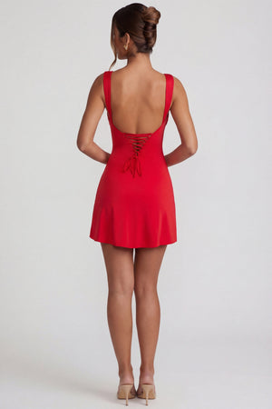 Oh Polly's Priscilla wearing the Violetta Mini Dress in Red Lycra fabric perfect for a night out