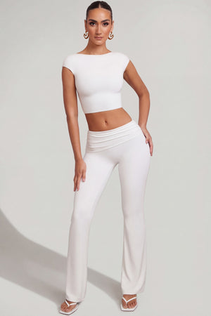 Oh Polly's Priscilla wearing the Hollis Regular Trousers in White Modal fabric perfect for office meetings