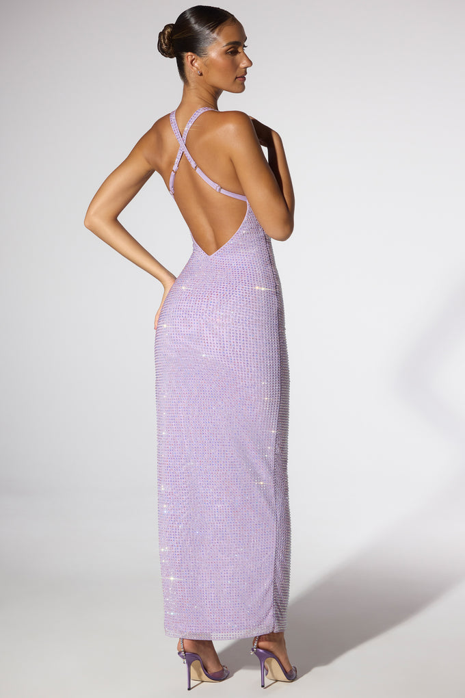 Vestido de noche con escote pronunciado y espalda baja adornado en color lila
