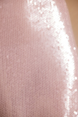 Top corto con lentejuelas transparentes y manga larga con lazo en la parte delantera en color lila
