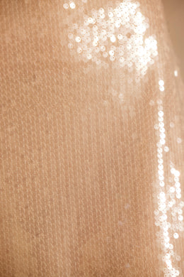 Top corto de manga larga con lentejuelas transparentes y lazo en la parte delantera en color canela
