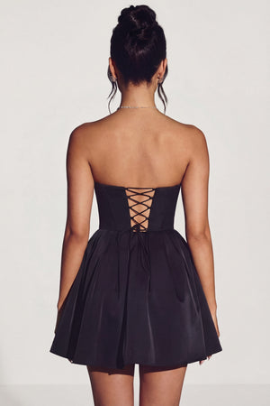 Oh Polly's Rona wearing the Emeline Mini Dress in Jet Black Tulle fabric perfect for cocktail parties