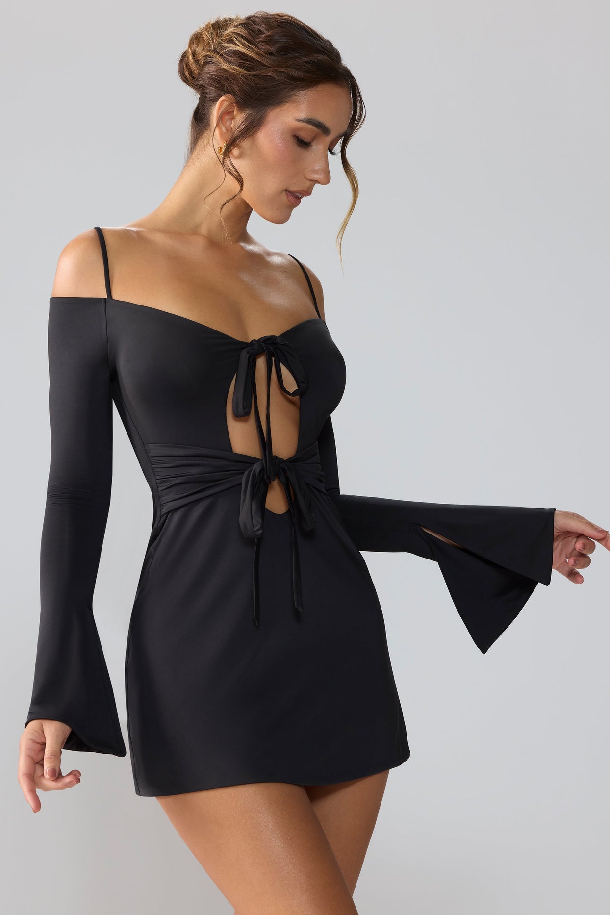 Slinky Jersey Long Sleeve Cut Out Mini Dress in Black