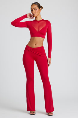 Pantalones de pernera recta con detalle drapeado en rojo fuego