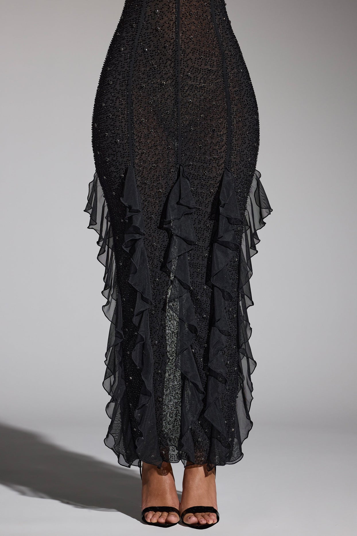 Anley Embellished Halter Neck Ruffle Maxi Dress in Black