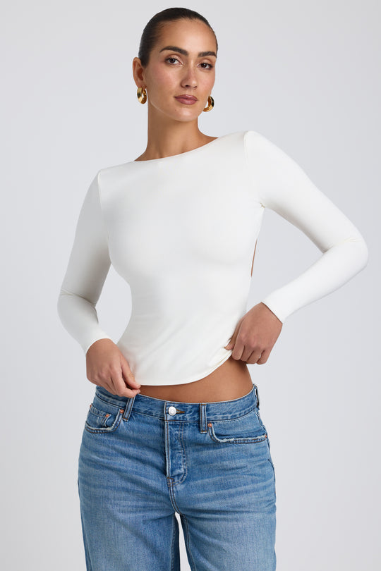 Elli Modal High Neck Long Sleeve Open Back Top in White | Oh Polly