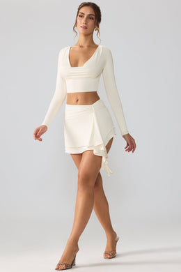 Slinky Jersey Mid Rise Ruffle Layer Mini Skirt in Ivory