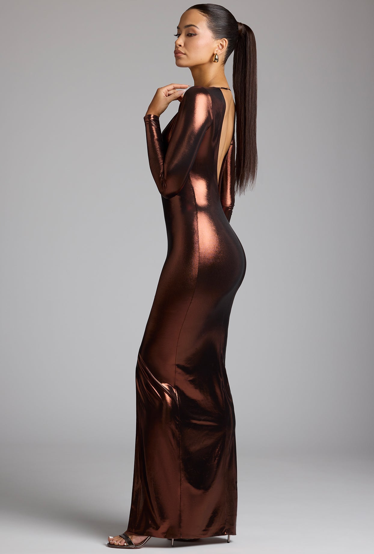 Safiya Long Sleeve Plunge Neck Metallic Jersey Evening Gown in Copper Bronze