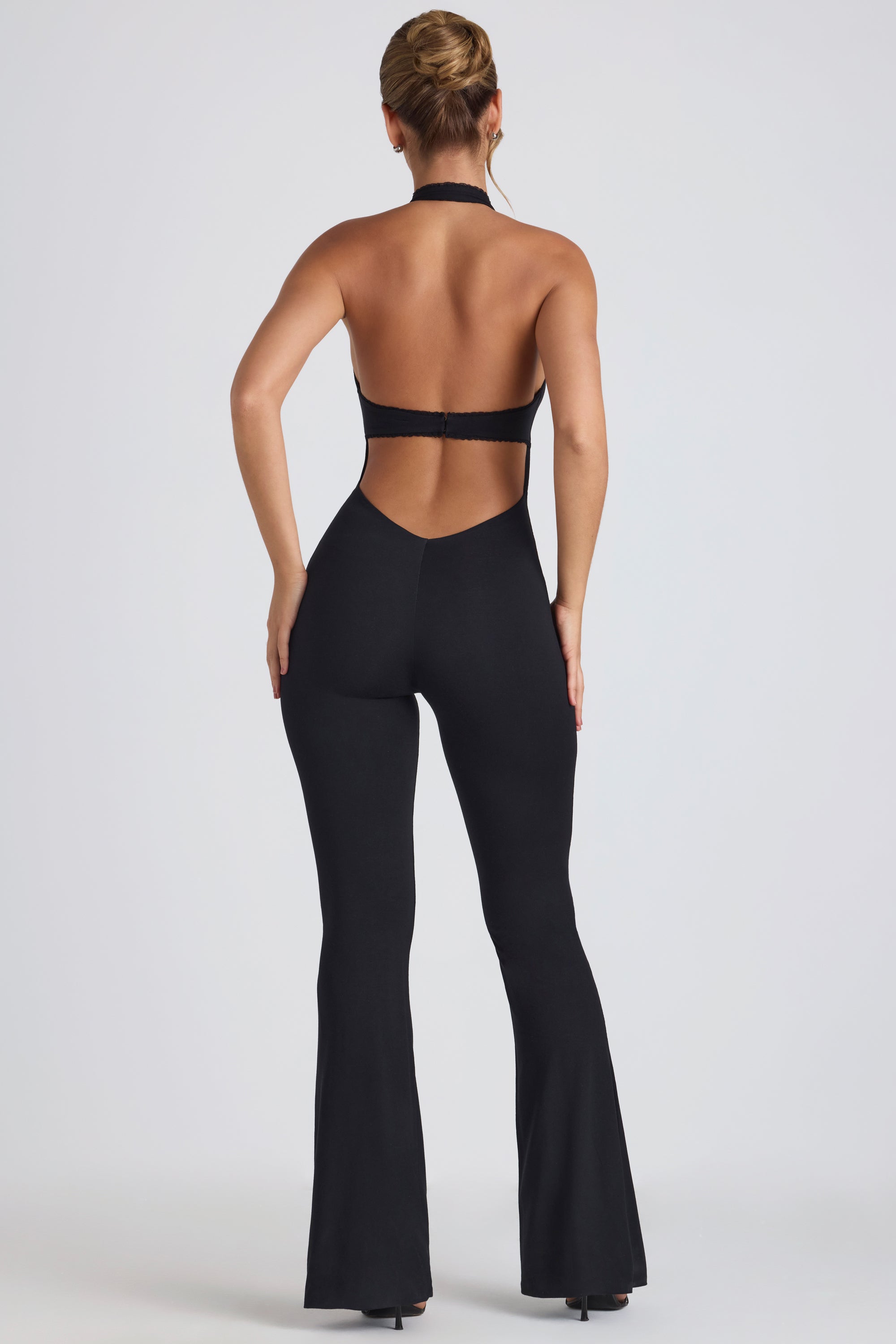 Pema Modal Lace-Trim Cut-Out Flared Jumpsuit in Black | Oh Polly