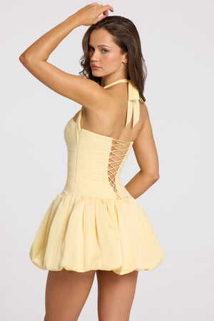 Ludmila Halterneck Lace-Up Bubble Hem Corset Micro Mini Dress in Butter Yellow | Oh Polly Ludmila Halterneck Lace-Up Bubble Hem Corset Micro Mini Dress in Butter Yellow | Oh Polly