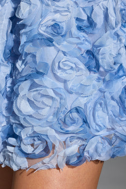 Minifalda con apliques florales en azul