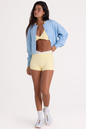 Bo+Tee model Nikki wearing the Christmas Knits Cardigan in Powder Blue Knitwear fabric perfect for cozy winter nights