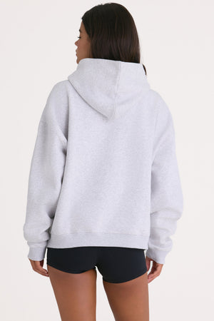 Bo+Tee model Cristal wearing the Off-Duty Hoodie in Heather Grey Cotton fabric perfect for weekend errands