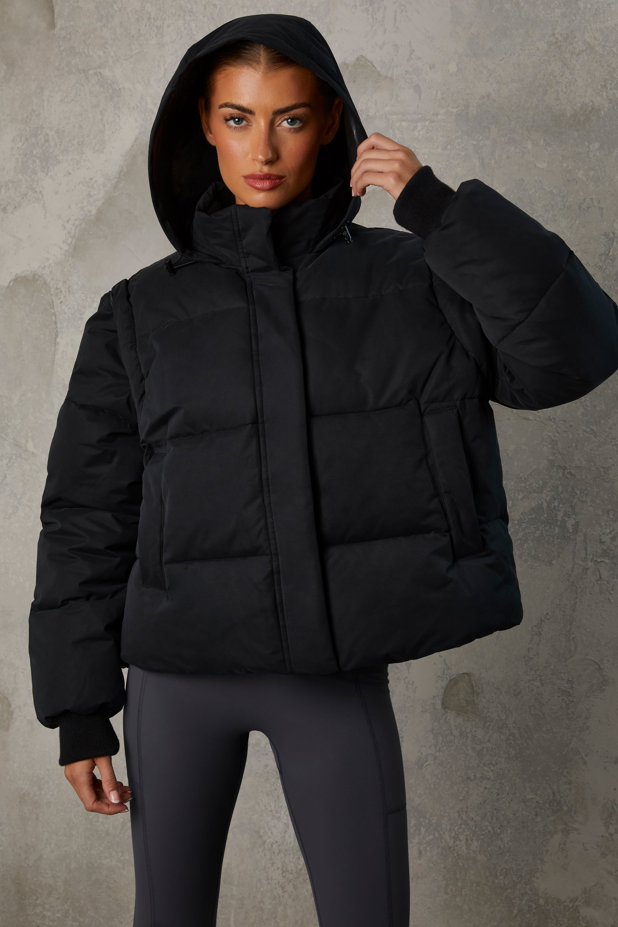 Essential Cropped Puffer Jacket with Detachable Sleeves in Black | Oh Polly