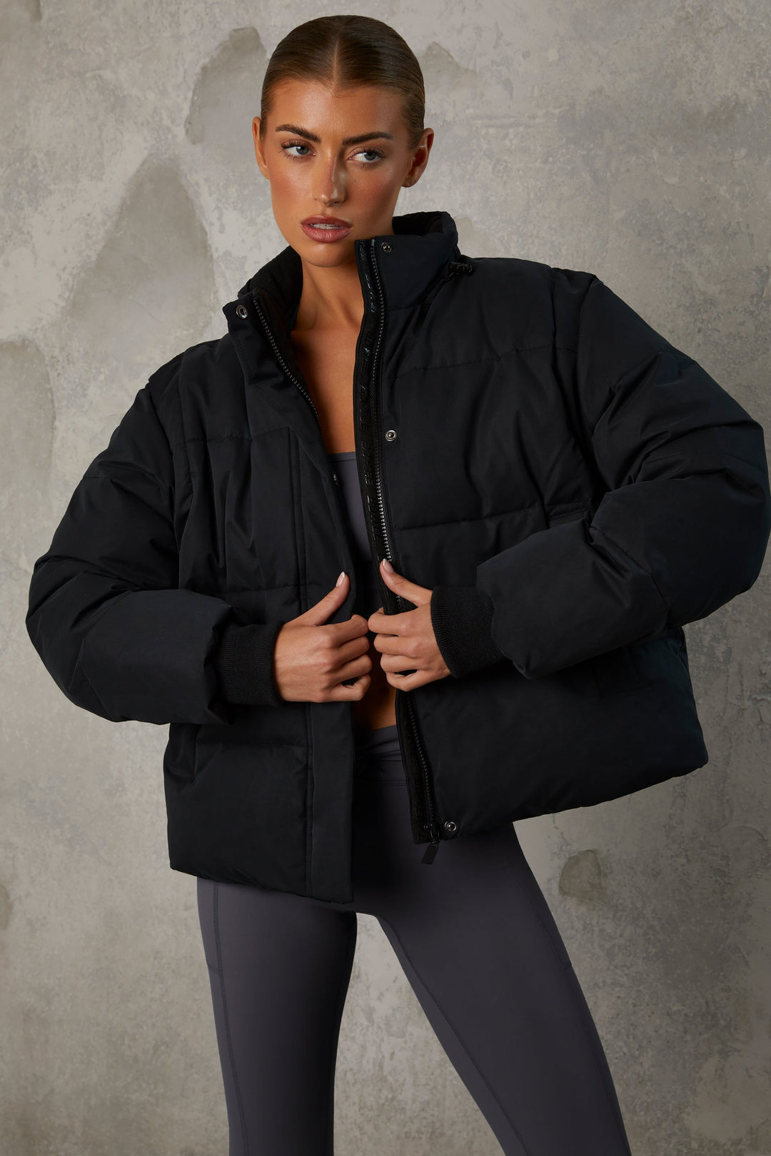 Essential Cropped Puffer Jacket with Detachable Sleeves in Black | Oh Polly