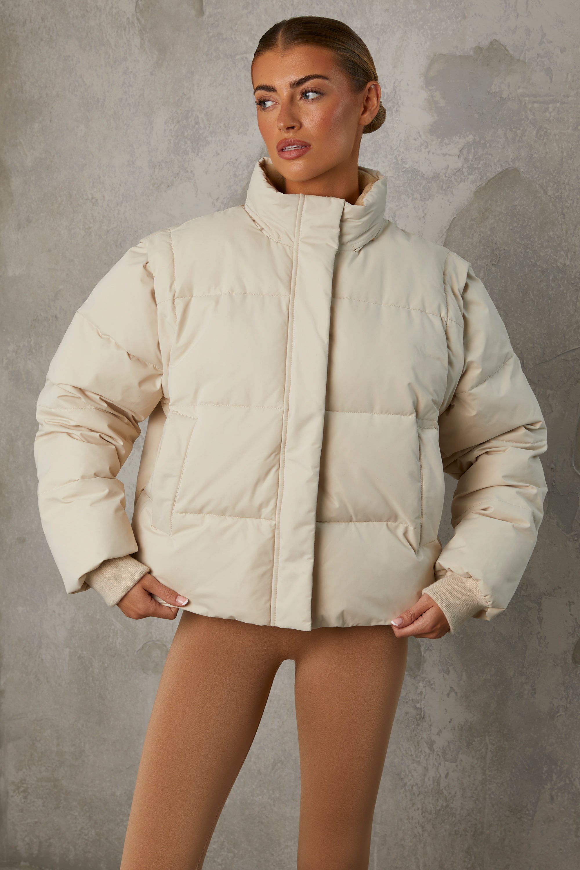 Essential Cropped Puffer Jacket with Detachable Sleeves in Sand