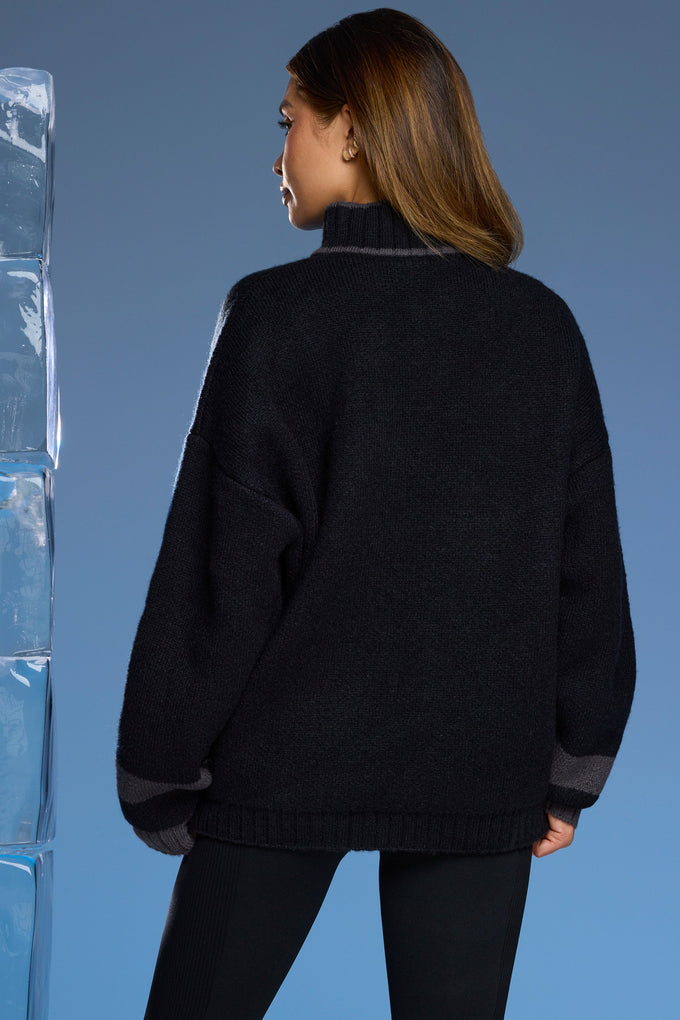 Suéter grande de malha grossa com meio zíper em preto