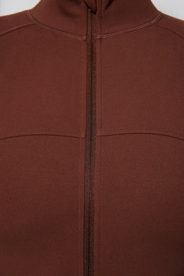 Jaqueta de manga comprida com zíper em chocolate
