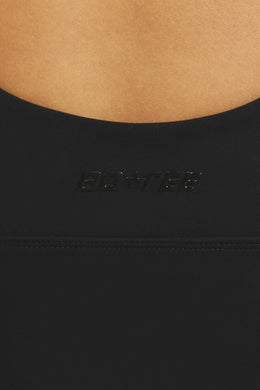 Camiseta sin mangas suave y activa con cuello en V en negro azabache