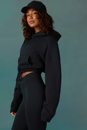 Progess Cropped Drawstring Hooded Sweatshirt in Black | Oh Polly