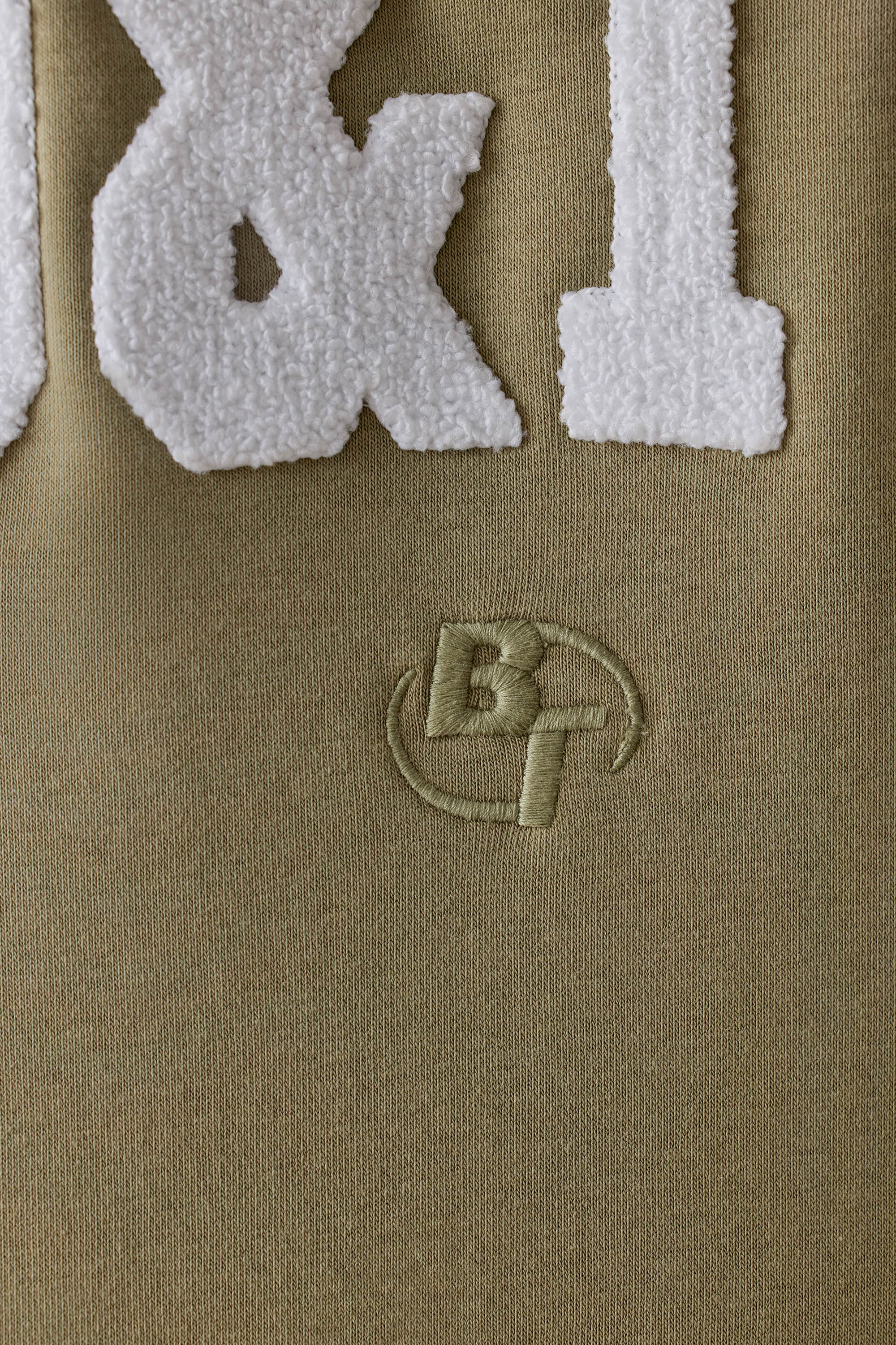 Hero Oversized Hooded Sweatshirt in Soft Olive | Oh Polly